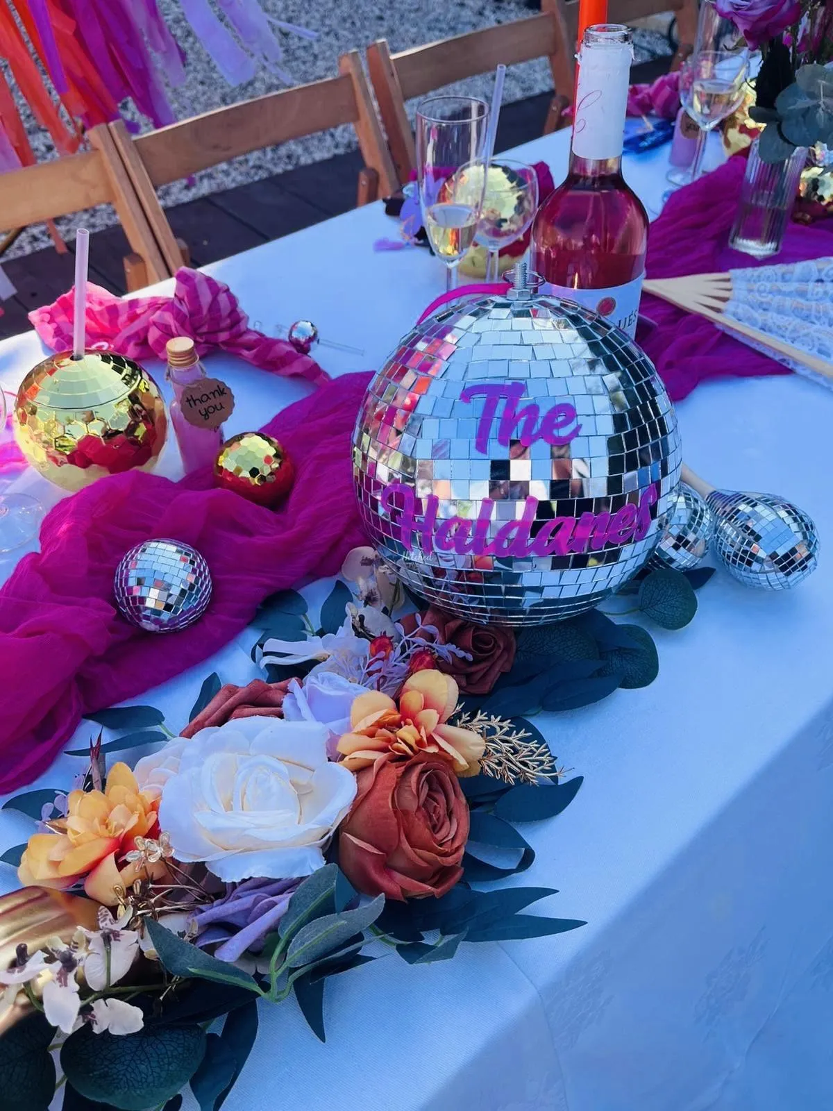 Colourful disco-themed wedding table decorations