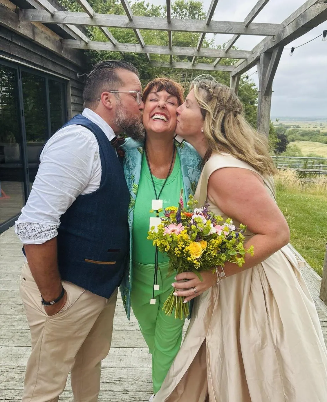 Hazel with a newly married couple