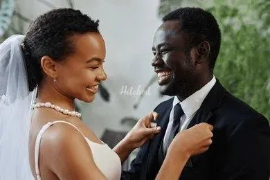 Bride and groom laughing together